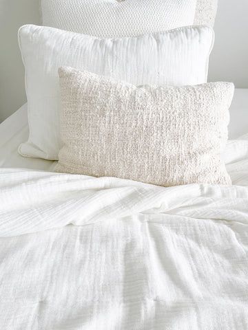 light and comfortable white and beige pillows for the bedroom